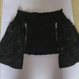 Black lacy off the should top with wide sleeves